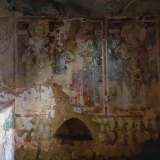 Sulle pareti laterali dei transetti riconosciamo le figure di sant�Eligio, i santi Cosma e Damiano...